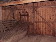 Inside old barn is an old thing for timber and crops 